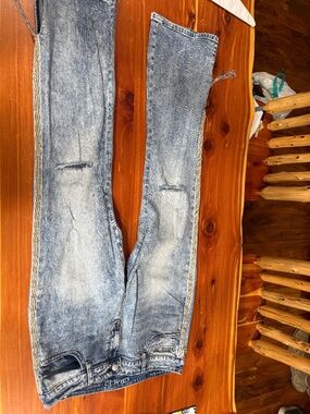 Grace LA denim distressed stonewashed bootcut with rhinestone embellishments